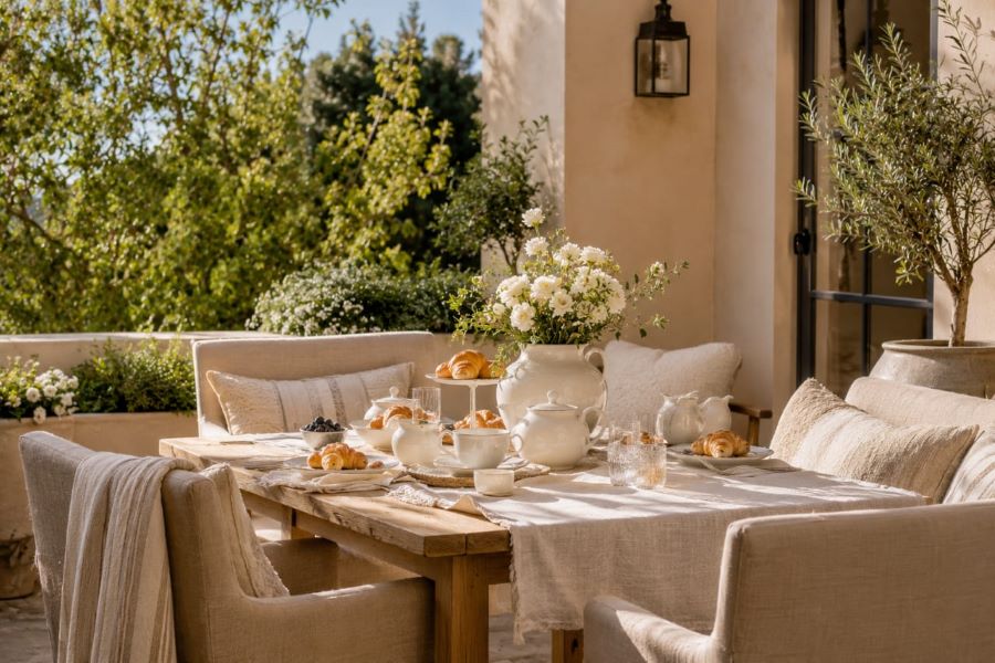 Outdoor breakfast nook with tea and decor accents
